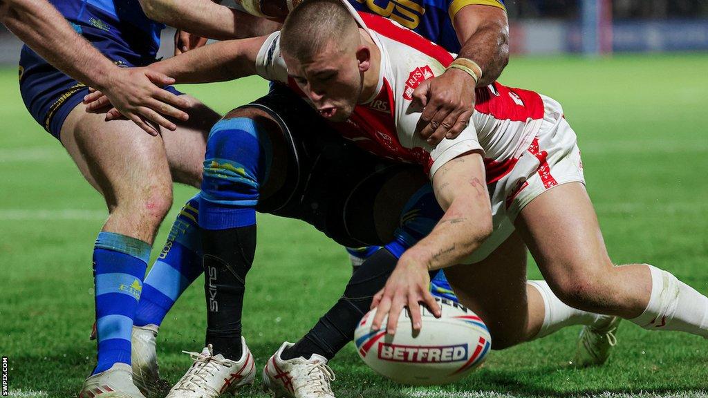 Mikey Lewis scores a try for Hull KR