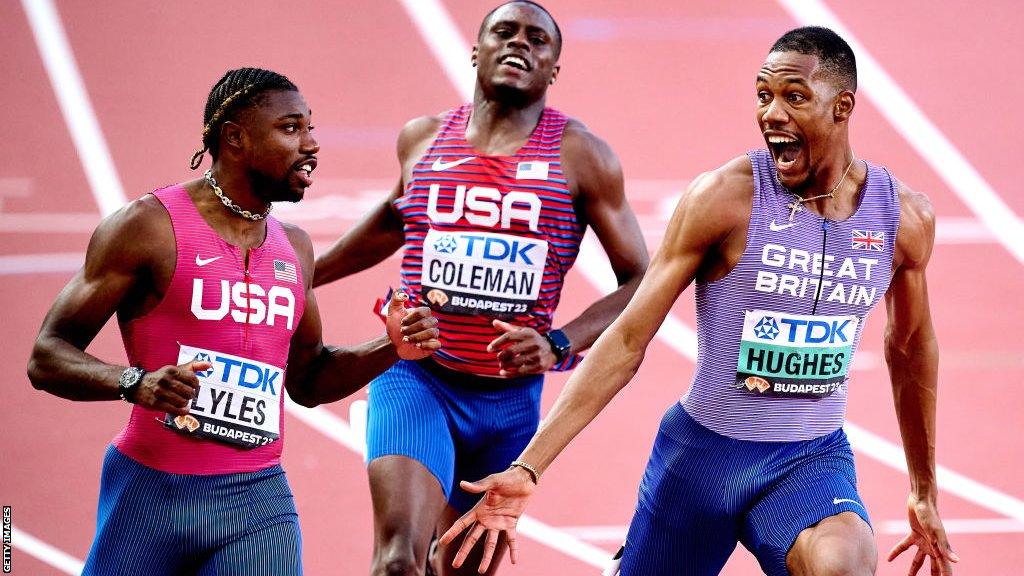 Zharnel Hughes celebrates as he crosses the line at the World Athletics Championships