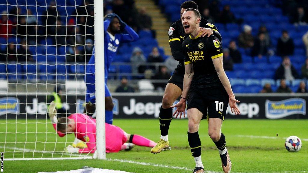 Will Keane celebrates