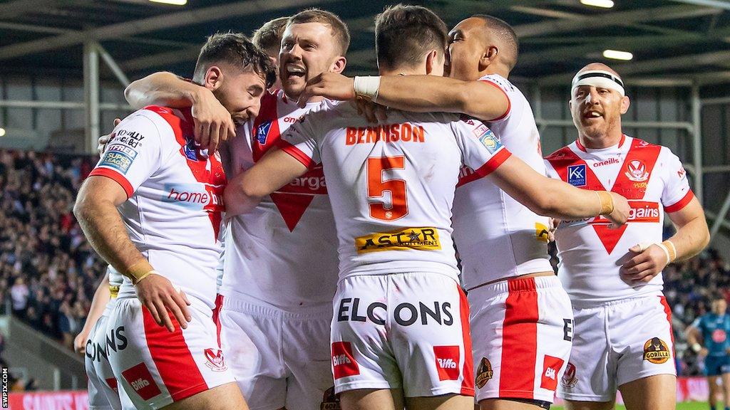 Jon Bennison celebrates his score as St Helens pull clear of Warrington