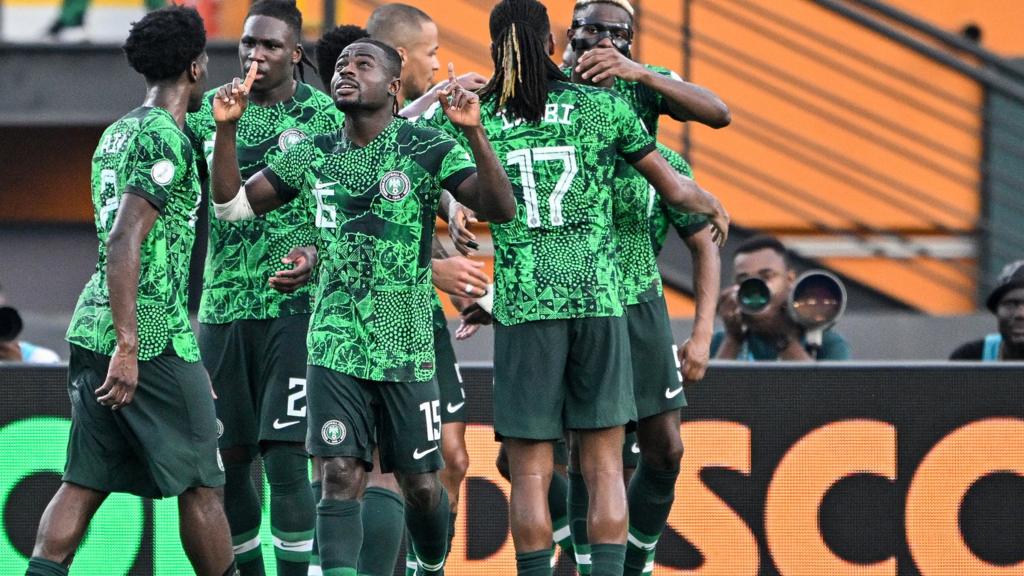 Nigeria celebrate a goal against Angola