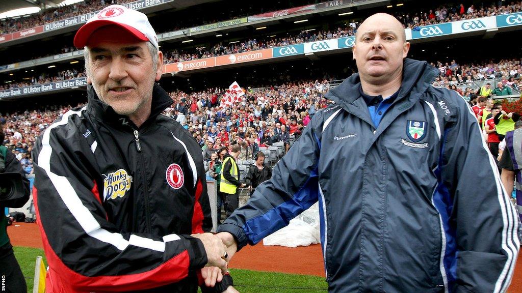 Mickey Harte and Malachy O'Rourke shake hands after Tyrone's All-Ireland quarter-final win over Monaghan in 2013