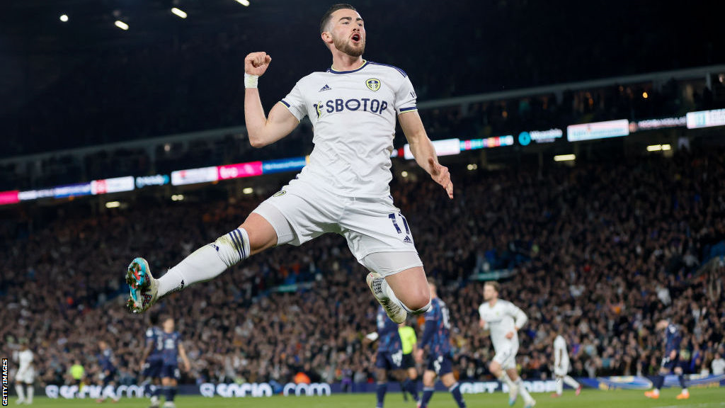 Jack Harrison in mid-air celebrating his goal against Nottingham Forest