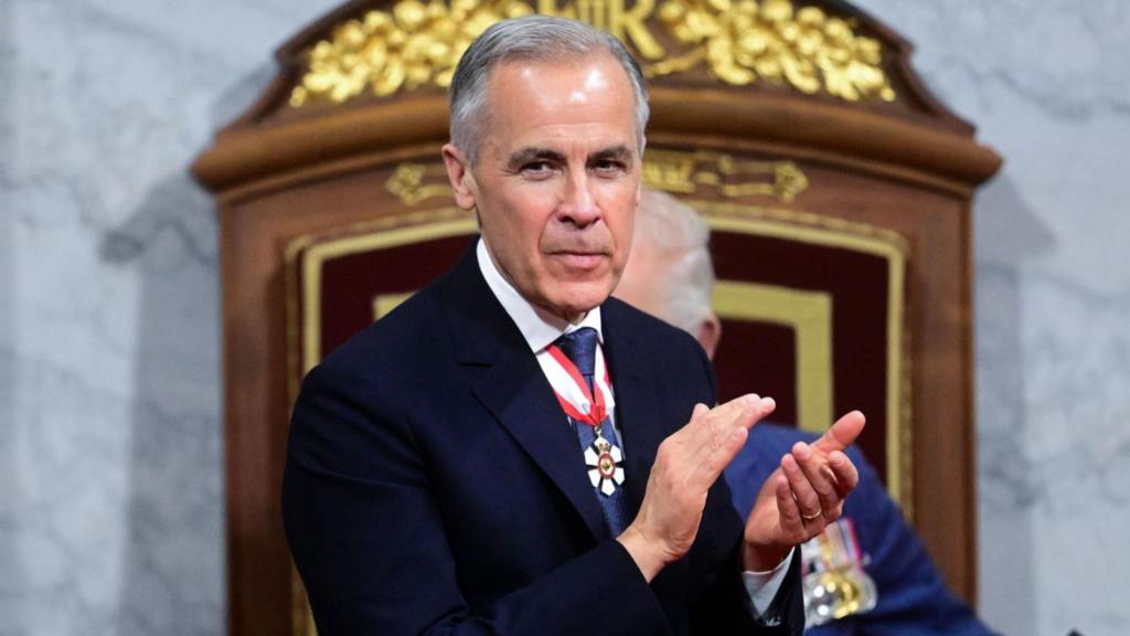 Mark Carney clapping