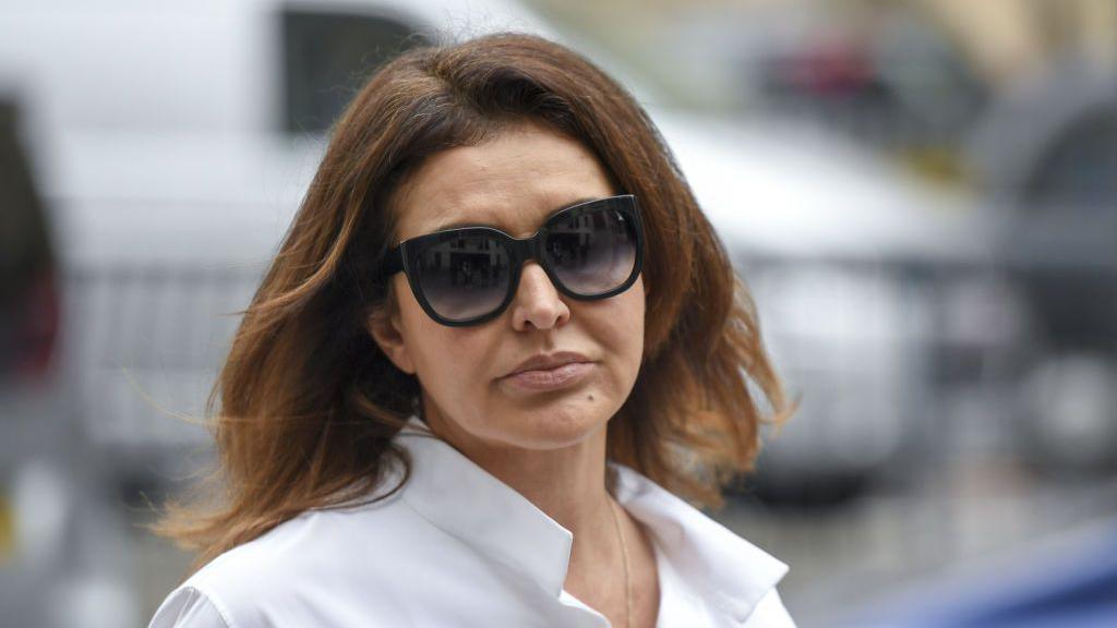 Zamira Hajiyeva photographed wearing a white shirt and sunglasses at an appearance at Westminster Magistrates' Court on 24 June 2019.