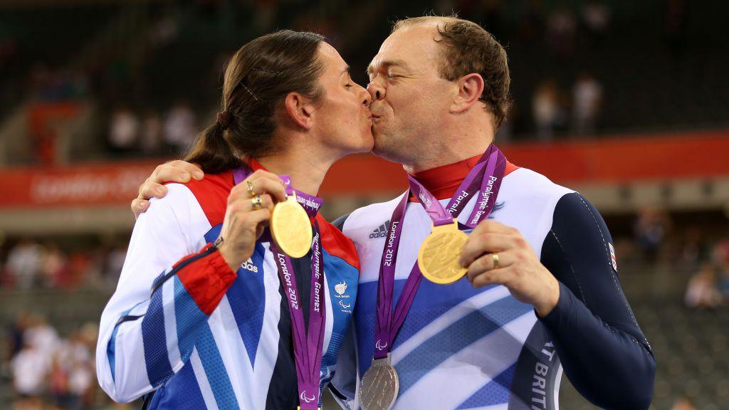 Sarah Storey and Barney Storey celebrate their gold medals