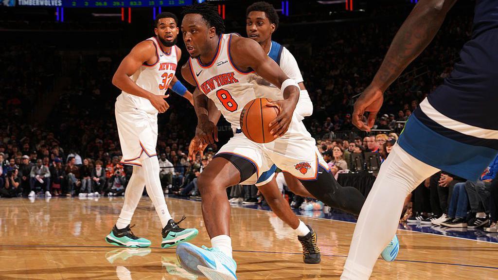 OG Anunoby dribbles with the ball