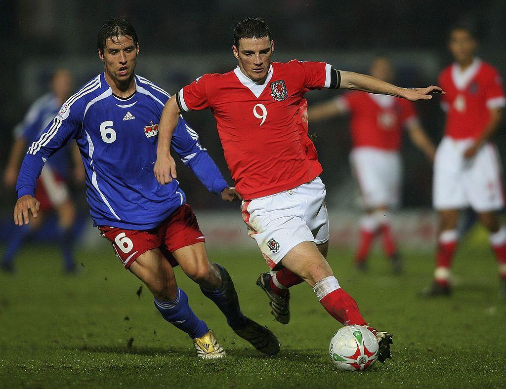 Jason Koumas runs with the ball for Wales against Liechtenstein