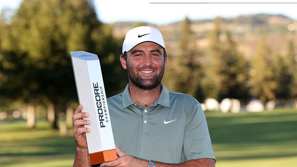 Scottie Scheffler celebrates winning the US PGA Tour Procore Championship