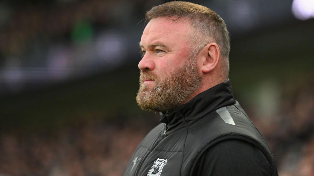 Wayne Rooney on the touchline at Plymouth Argyle