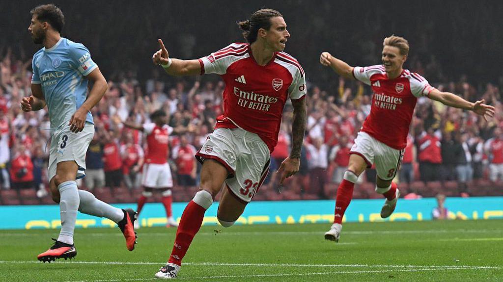 Riccardo Calafiori celebrates scoring a goal