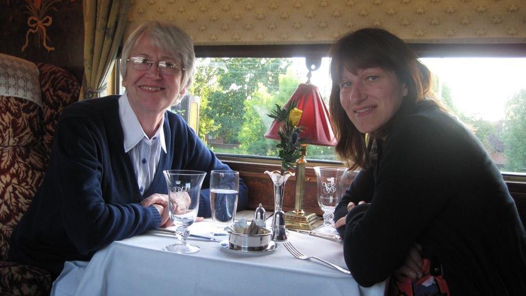 Mary Jones and Christine Wadsworth together on a train