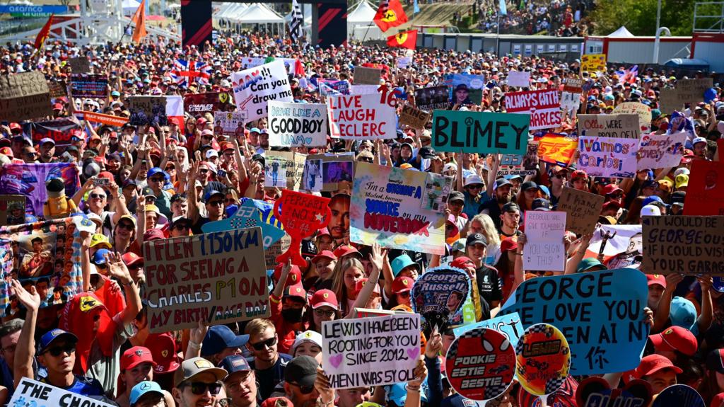 Hundreds of fans gathered together with many holding up homemade banners for the favourite drivers at the Hungarian Grand Prix