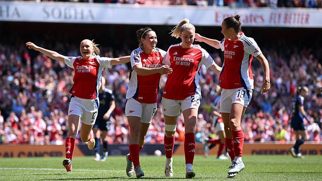 Arsenal celebrate scoring at the Emirates