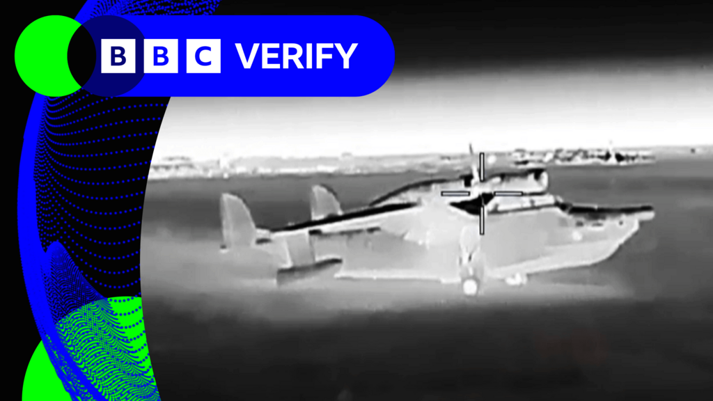A screengrab from a video showing an apparent drone attack on a Russian amphibious aircraft in occupied Crimea