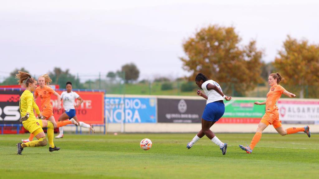 Michelle Agyemang scoring a goal for England U19 team against the Netherlands U19 in December 2023. 