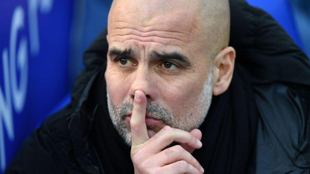 Pep Guardiola looks pensive