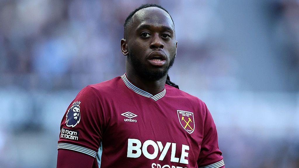 Aaron Wan-Bissaka in action for West Ham United wearing a claret-coloured shirt