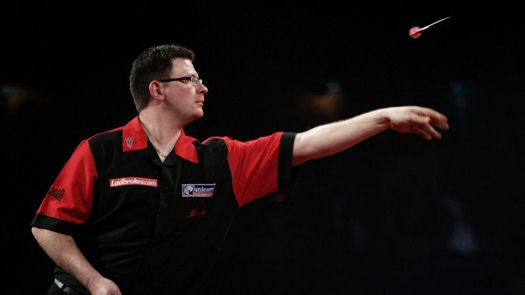 James Wade of England throws against Terry Jenkins of England during the third round match of The Ladbrokes World Darts Championship at The Circus Tavern, on December 28, 2006