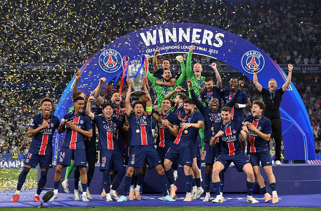 Paris St-Germain celebrate lifting the Champions League trophy