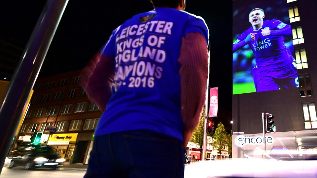 A Leicester fan celebrates