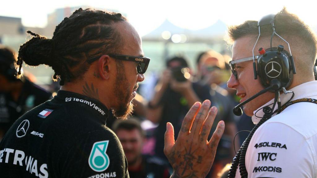 Lewis Hamilton of Great Britain and Mercedes talks with race engineer Pete Bonnington 