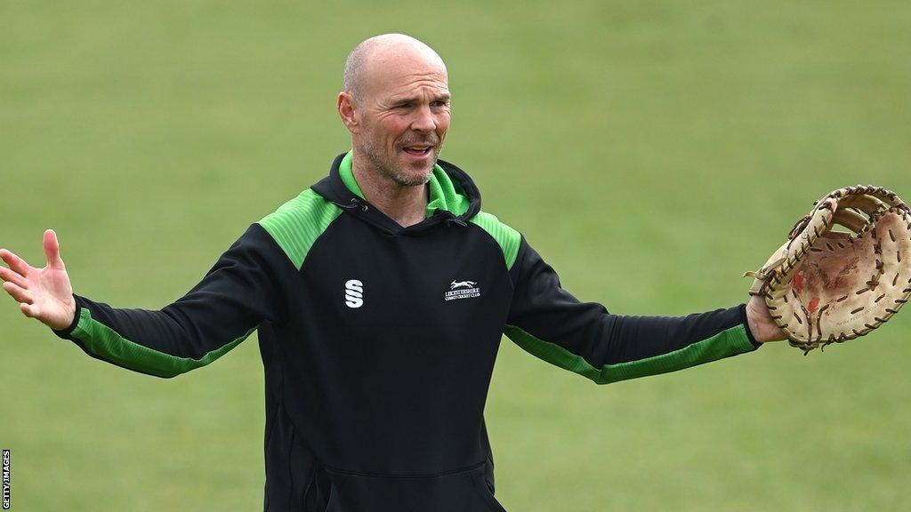 Paul Nixon with his hands up during fielding drills as Leicestershire head coach