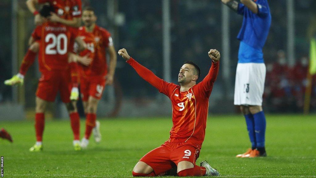 North Macedonia celebrate beating Italy in March 2022