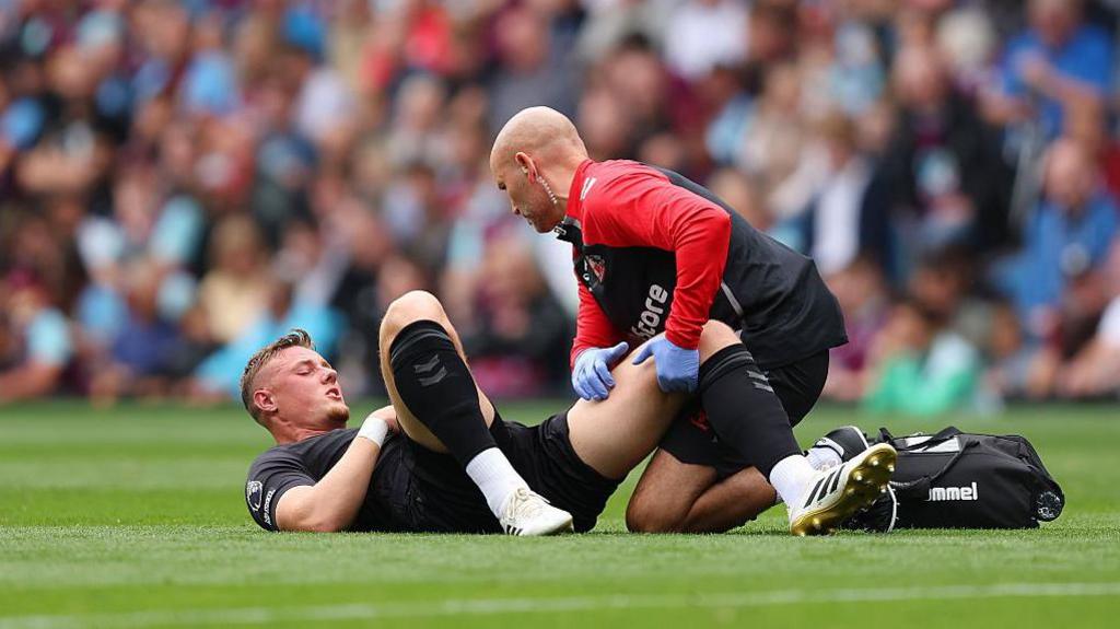 Daniel Ballard receives treatment