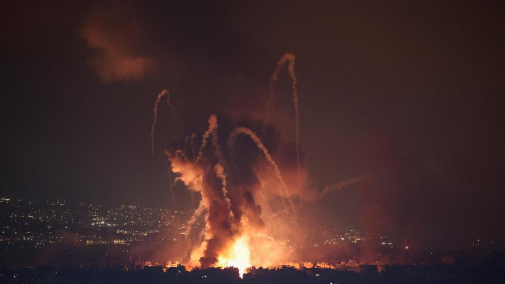 Smoke and flames rise in Beirut's southern suburbs, after Israeli air strikes, amid ongoing hostilities between Hezbollah and Israeli forces,