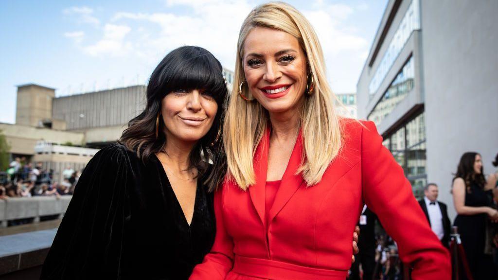 Tess Daly and Caludia Winkleman smiling together