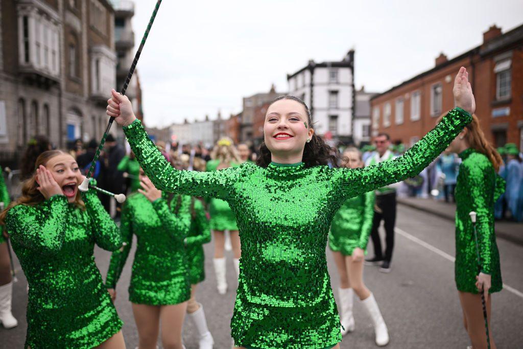 Dancers wearing green sequin costumes get ready for the St Patrick's Day parade in Dublin. 