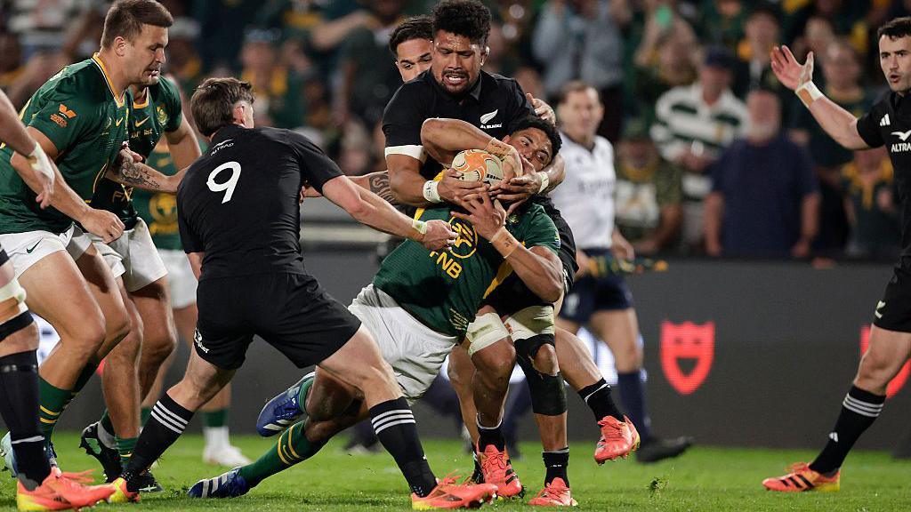 Sacha Feinberg-Mngomezulu is stripped of possession by New Zealand