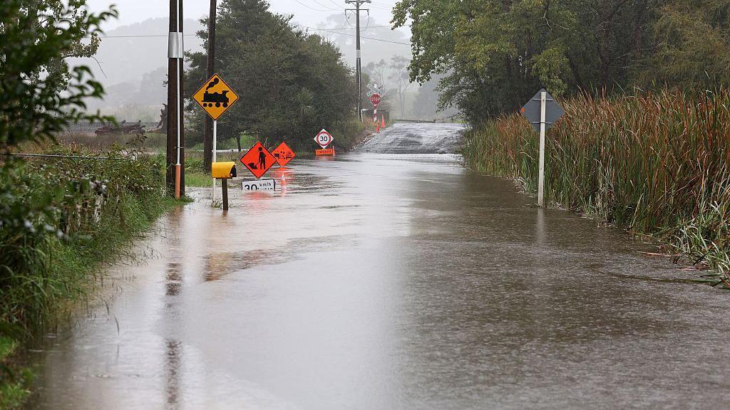 Roads flooded after heavy rain from Cyclone Vaianu near Warkworth on April 12, 2026 in Auckland, New Zealand. 