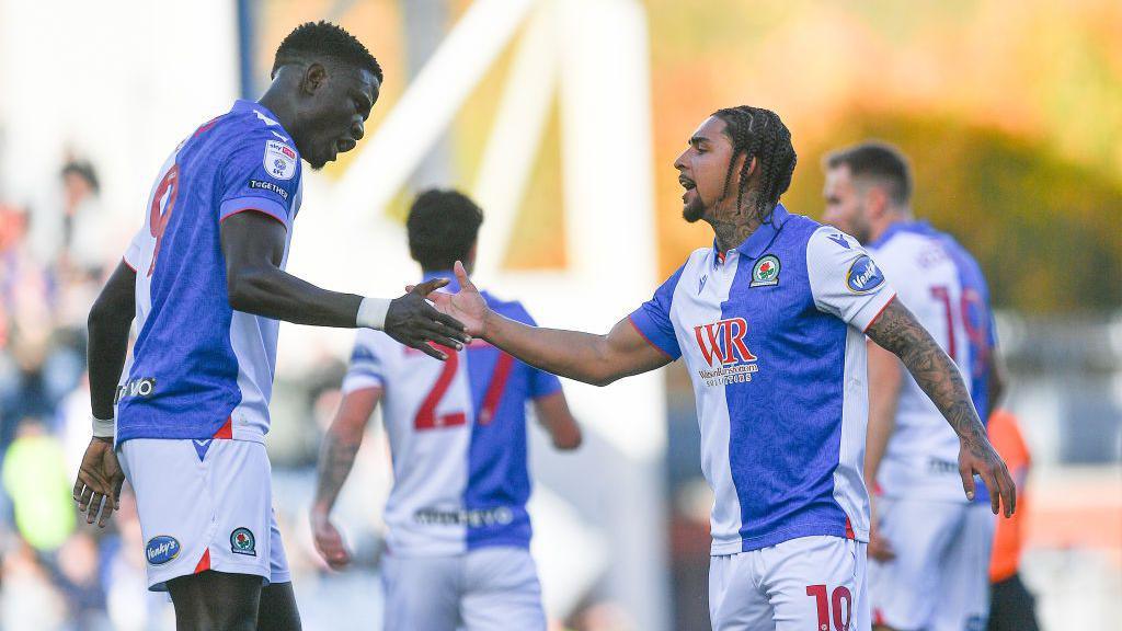 Tyrhys Dolan (right) celebrates scoring Blackburn's opening goal with Makhtar Gueye