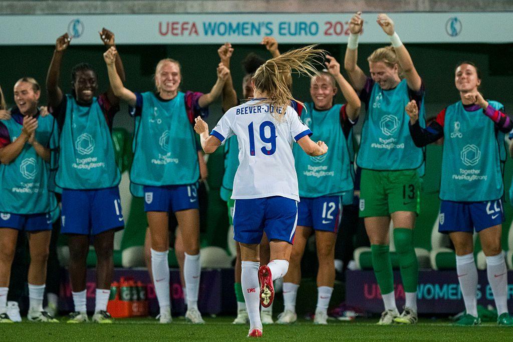 Aggie Beever-Jones celebrates scoring against Wales