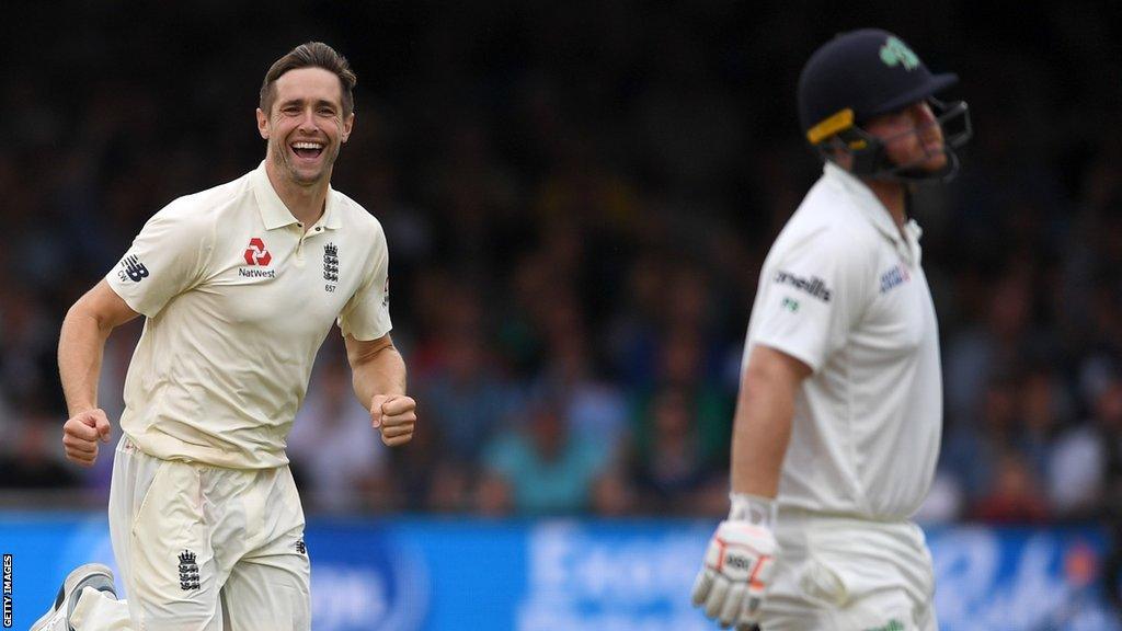 England's Chris Woakes celebrates dismissing Paul Stirling - the first of his six wickets in the seconds innings in the 2019 Test