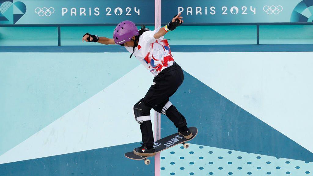 China's Cui Chenxi competing in the street skateboarding at Paris