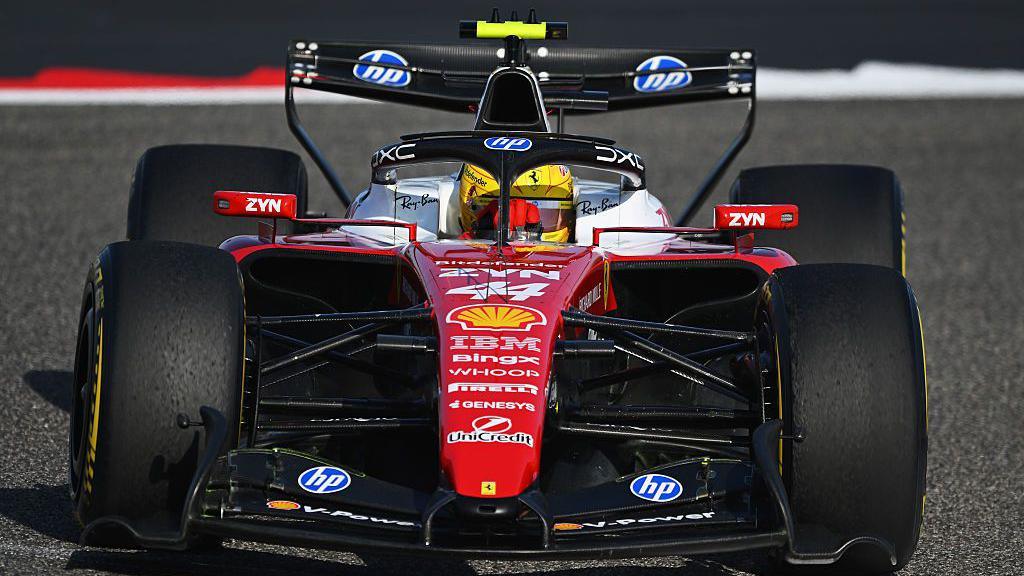 Lewis Hamilton drives the new Ferrari during testing in Bahrain 