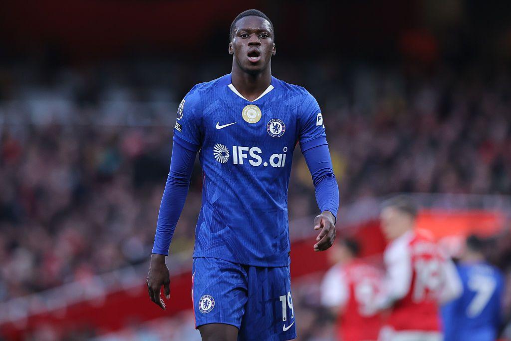 Mamadou Sarr looking towards the camera while playing for Chelsea against Arsenal 