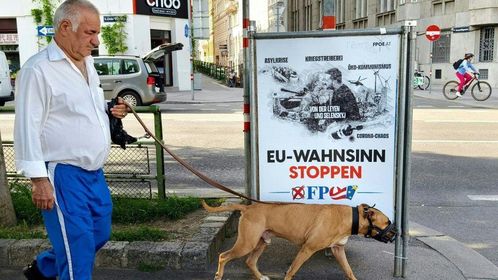 This Freedom Party poster shows  the European Commission chief embracing the Ukrainian president