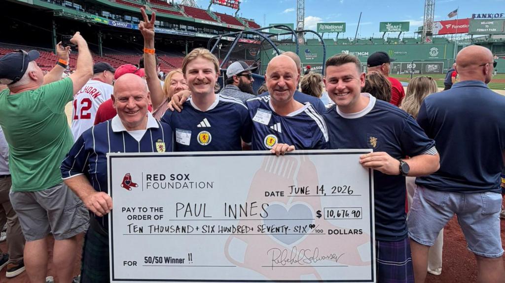 Scotland supporters with Boston Red Sox cheque