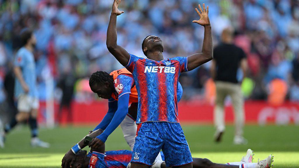 Marc Guehi of Crystal Palace celebrates victory following the FA Cup final