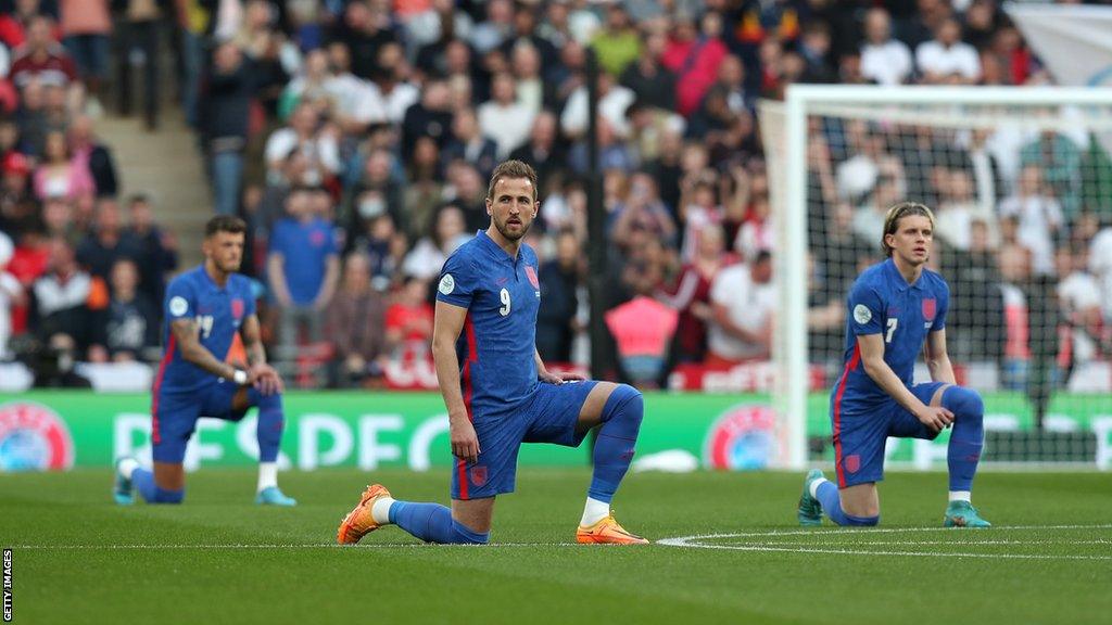 England players taking the knee before a match