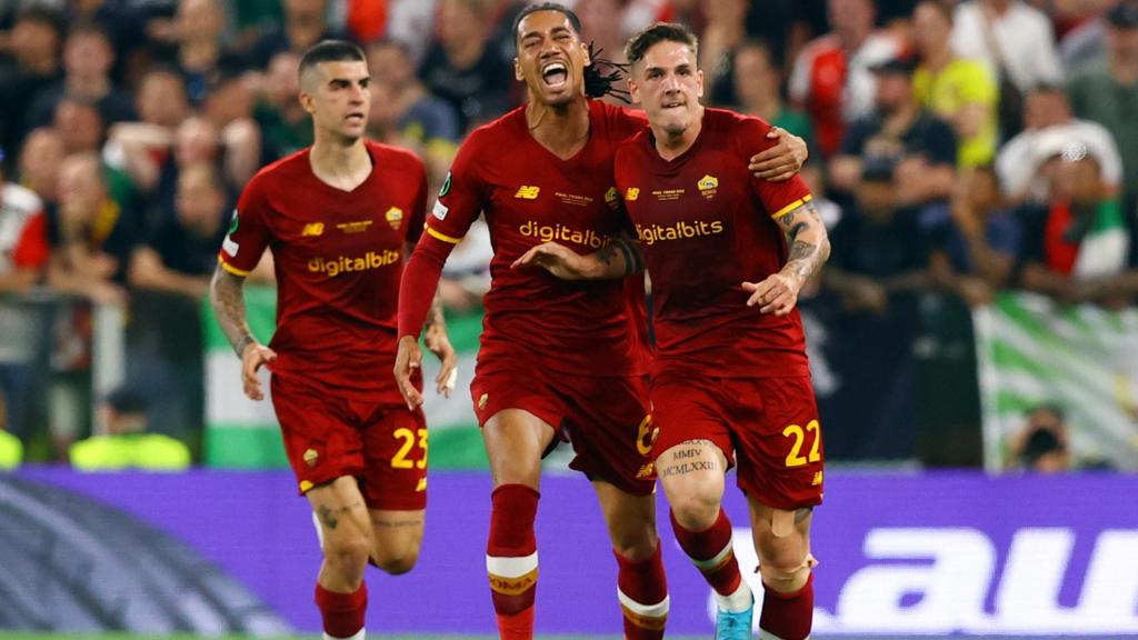 AS Roma's Nicolo Zaniolo celebrates scoring their first goal with Chris Smalling