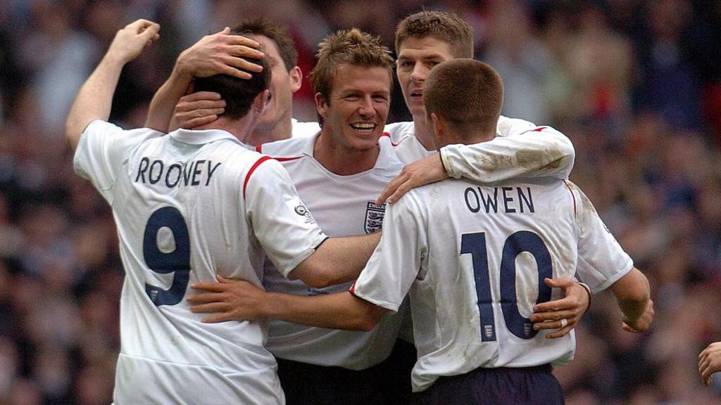 Michael Owen & Wayne Rooney celebrating an England goal with David Beckham