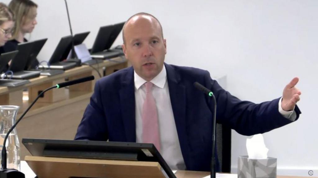 Hancock gestating with his right hand while speaking at the Covid inquiry