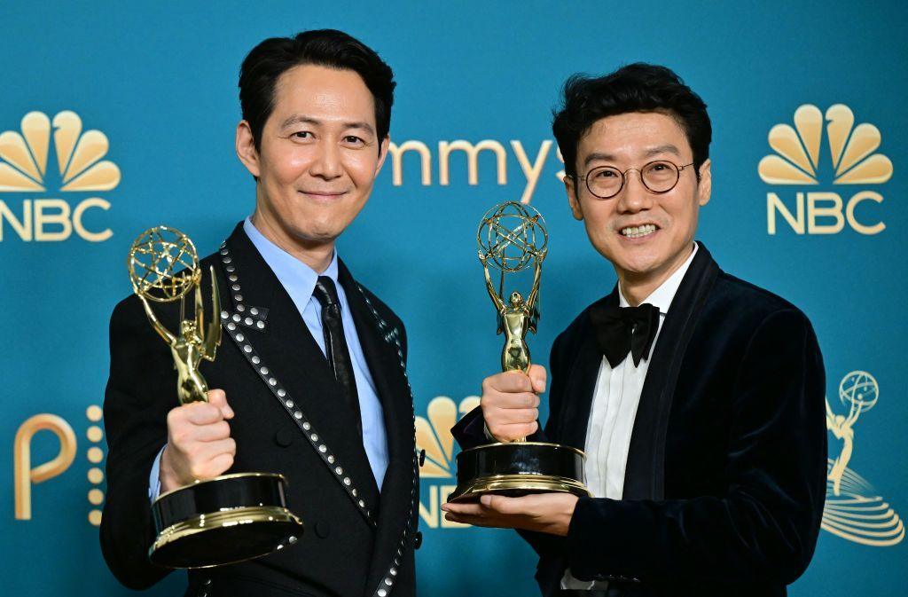 South Korean actor Lee Jung-jae (L) poses with the award for Outstanding Lead Actor In A Drama Series and South Korean director Hwang Dong-hyuk (R) with the Emmy for Outstanding Directing For A Drama Series for "Squid Game" during the 74th Emmy Awards at the Microsoft Theater in Los Angeles, California, on September 12, 2022. 