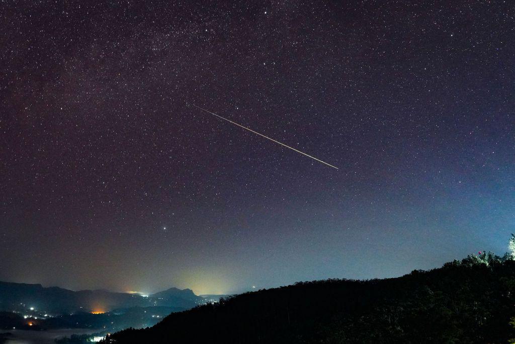 Perseid meteor in the night sky. 