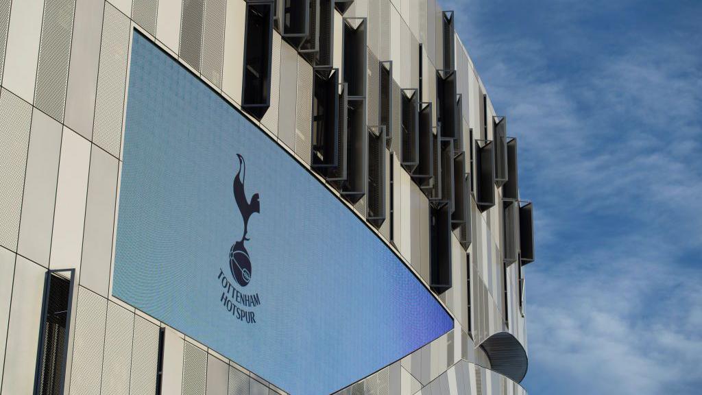 General view of the Tottenham badge outside the Tottenham Hotspur Stadium